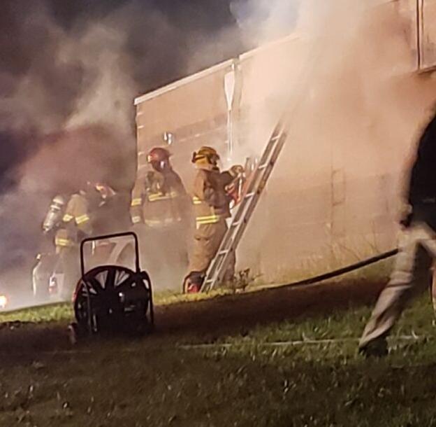 A firefighter cuts